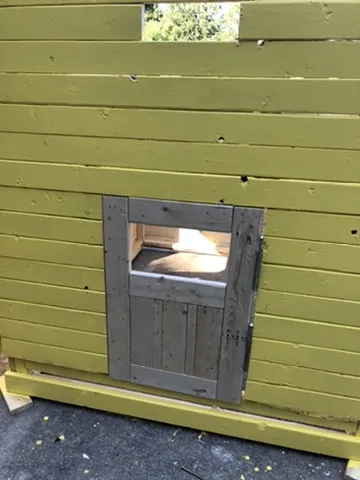 The people door, before its own coat of paint
