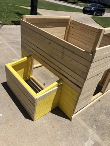 The nesting box takes shape, and the first coat of yellow
